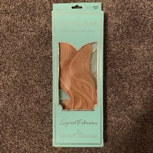 Halo Couture 16 in layered hair extensions